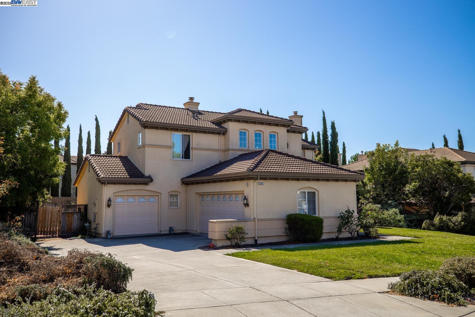 Fremont’s highly desirable and rarely available Vintage Grove neighborhood. This expansive 5-bedroom, 3-bathroom residence offers 2,767 sq ft of living space and is ready for you to transform it into the home of your dreams.  Step into the grand foyer with vaulted ceilings.  Formal living and family rooms, each with its own cozy fireplace, as well as a dedicated dining room with French doors opening to the backyard.  The kitchen features stainless steel appliances, a gas cooktop, and tile countertops—offering a solid foundation for your future upgrades. A full bedroom and bathroom downstairs provide convenience for guests or multi-generational living.  Upstairs, the grand spiral staircase leads to four additional bedrooms, including a spacious primary suite with sweeping views of the Mission Hills. The en-suite bathroom includes double sinks, a soaking tub, a stall shower, and a huge walk-in closet.   The backyard is beautifully landscaped with stucco retaining walls, raised planters, and a concrete patio—ready for your personal touches. Additional highlights include dual-zone heating and A/C, a three-car garage, a large driveway, a dedicated laundry room with sink, and no HOA.  Close proximity to Weibel Elementary, Ohlone College, and I-680.  Walk to Mission Peak Trail Head!