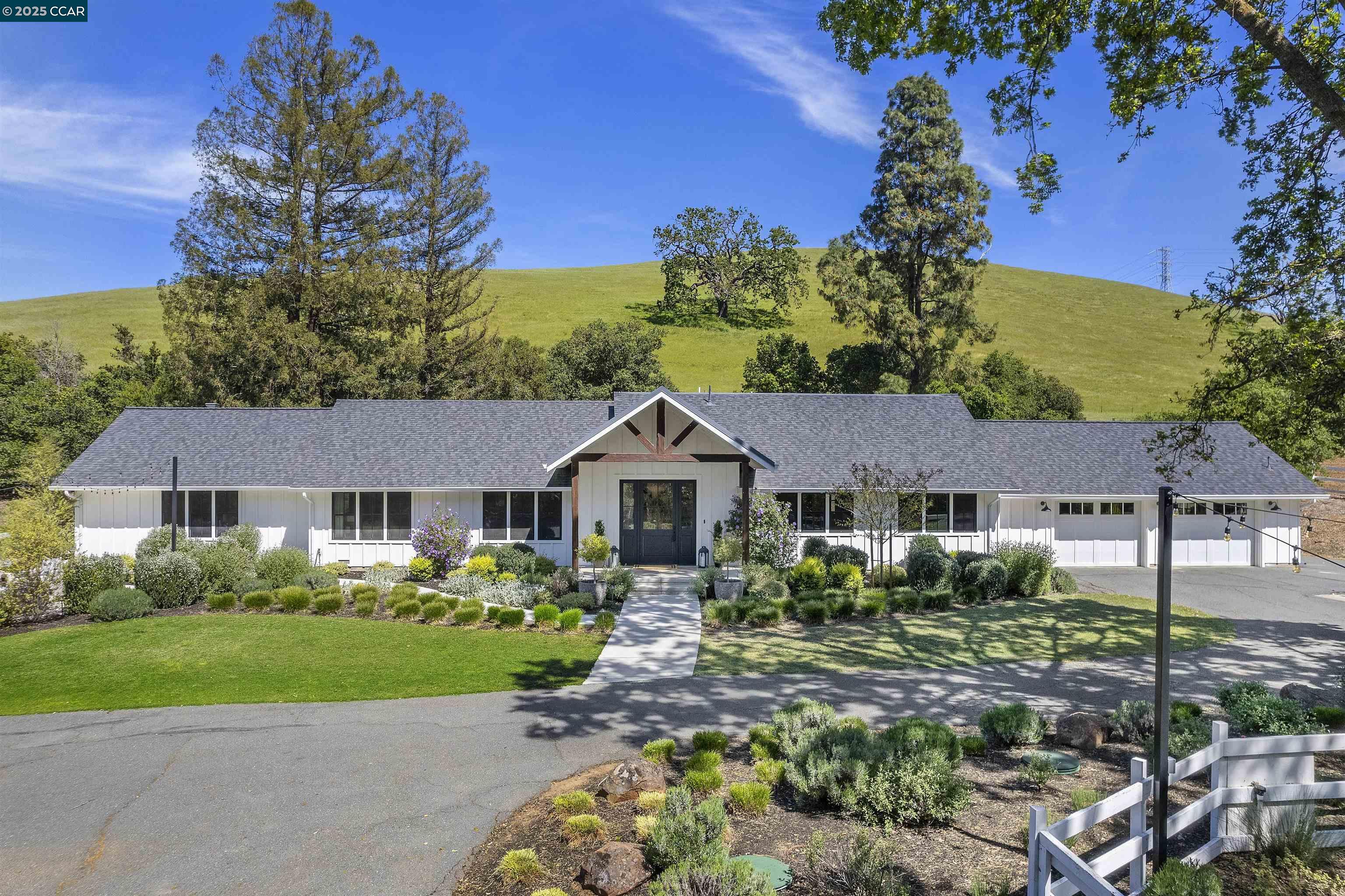 Fabulous, fully-renovated, modern farmhouse on premium 2.15AC Lot with Pebbletec pool and trail access. Idyllic gated property at end of Pine Creek Road with panoramic views of Mt Diablo foothills.  Direct access to hiking and equestrian trails to Mt. Diablo, Shell Ridge and Castle Rock Park from the back gate!  4 BR + Office / 3 BA -- fully renovated with luxury finishes, open floorplan, dream kitchen (large island, custom cabinets, Quartzite counters, farmhouse sink, Sub Zero refrigerator, Wolf gas range, new dishwasher) and large butler pantry. Whole house wide-plank engineered flooring, new doors, trim, electrical.  Three full bathrooms (Ann Sacks tile, Restoration Hardware fixtures and vanities, free standing tub in primary bath), laundry room (farmhouse sink, marble counter, cabinets), family room with custom barn door, gas fireplace and slider to backyard.  All new exterior doors, Hardie Plank siding, Marvin Integrity wood windows, new roof and gutters, chicken coop, planter boxes, complete landscape remodel in 2020 (hardscape, gas firepit, lawn, lighting) and complete pool remodel.