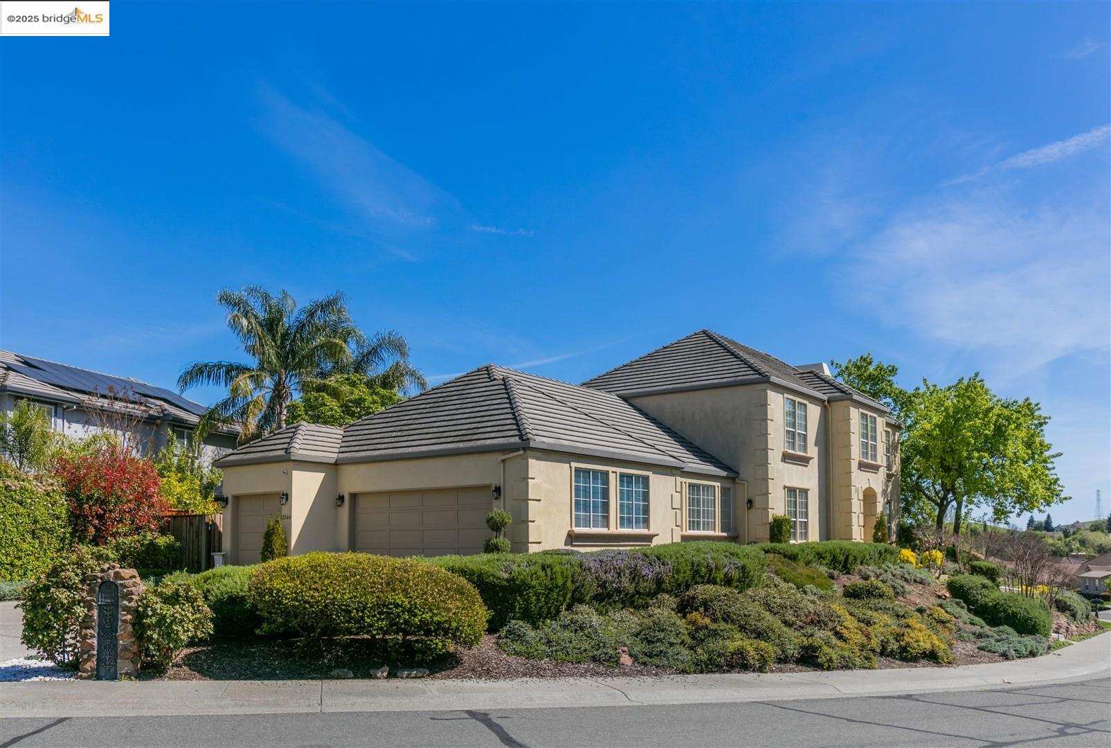 Nestled atop a knoll in the prestigious gated Rancho Solano community, this stunning custom build 4-bed, 3.5-bath home offers 3,283 sqft of luxury living. The grand foyer leads to spacious formal living and dining rooms, while the gourmet kitchen features natural quartzite countertops, stainless steel appliances, and a breakfast nook. The family room, with a fireplace and wet bar, is perfect for relaxation. A luxurious master suite boasts a fireplace, walk-in closet, and spa-like bath with marble finishes. A private bedroom and full bath are located on the main level, ideal for guests. Outdoors, enjoy beautifully landscaped front and backyards with a flagstone patio and mature trees. The oversized 2-car garage is complemented by an additional garage perfect for a golf cart. Every detail of this home has been meticulously updated. Located in one of Rancho Solano’s most coveted neighborhoods, this home combines elegance, comfort, and a prime location. A true gem awaiting you!