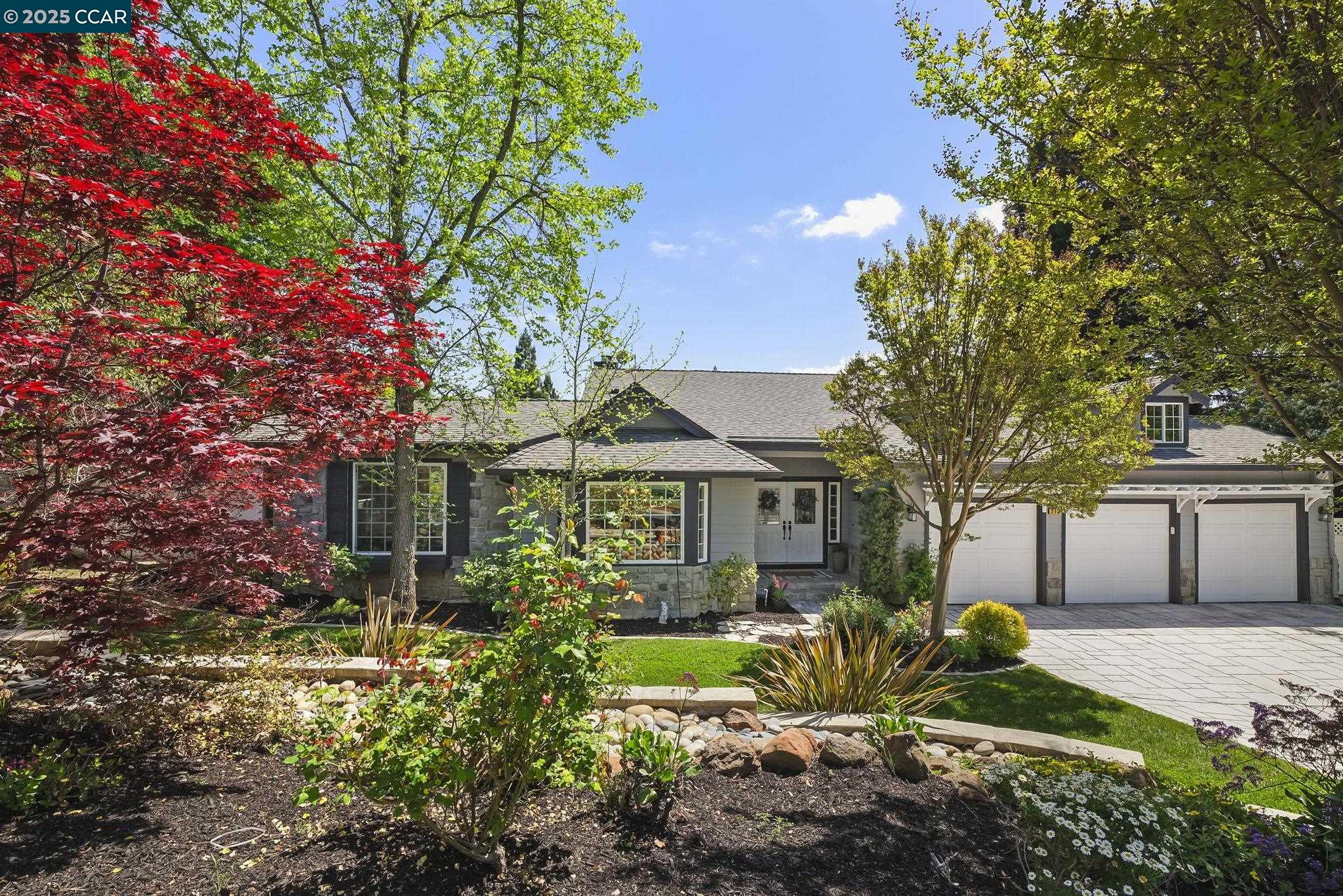 Beautiful custom home in a sought-after Danville neighborhood with views. This 4 bed, 3 bath home offers 3,158 sq ft on a 0.36-acre lot. Timeless hardwood floors, custom woodwork, soaring ceilings, and large windows that showcase serene hillside and Las Trampas views. Chef’s kitchen with 6-burner Wolf stove, stainless steel appliances, white cabinetry, granite counters, and a large island opens to a cozy family room with gas fireplace and beadboard ceiling. Formal living and dining rooms provide elegant entertaining space. And, a second family room! The spacious primary suite features hillside views, a steam shower, jetted tub, and granite counters. The backyard is a showstopper with a sparkling pool, built-in hot tub, outdoor kitchen, TV mount, firepit, putting green, and a covered deck with ceiling fan—perfect for enjoying Danville evenings. 3-car garage and prime location complete the package. A must-see!