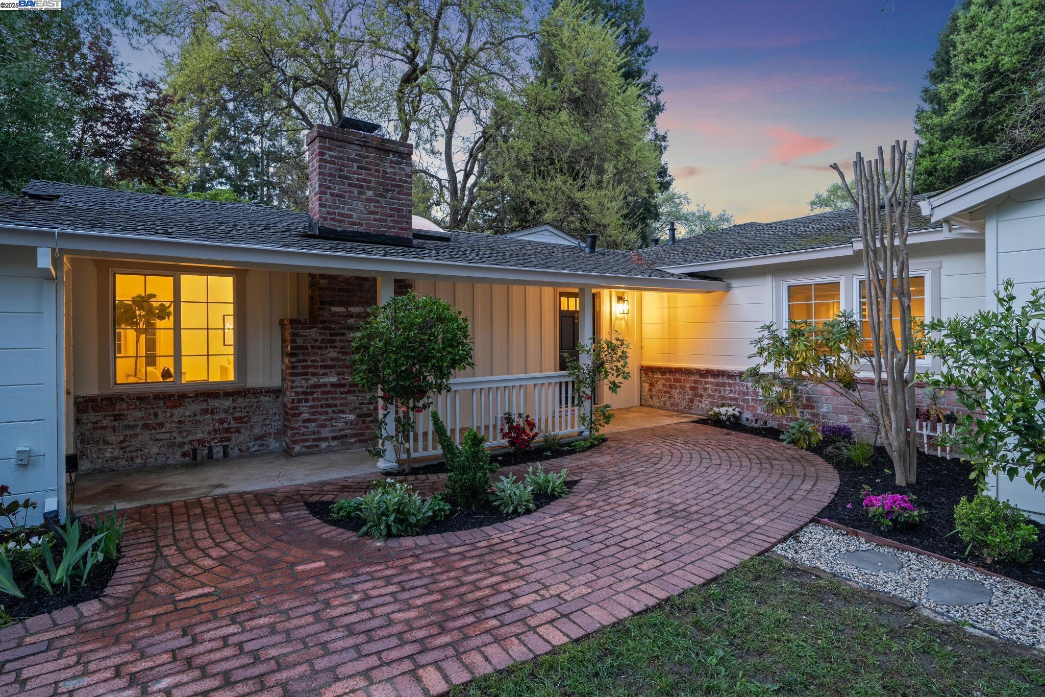 Discover the charm of this single-story rancher in prime Westside Danville, perfectly situated on a sprawling nearly ½ acre lot. Boasting 5 bedrooms, a separate office, and 3 full baths across 2,885 sq. ft. of thoughtfully designed living space, this home offers both comfort and versatility. The spacious kitchen-living room combo with island for casual dining and features a charming Dutch door leading to the backyard, creating seamless indoor-outdoor living. A functional floor plan includes a bonus room area next to two bedrooms and a full bath, ideal for guests or extended family. The luxurious primary suite with direct backyard access offers an adjoining  office or nursery for flexibility. The private, expansive yard is perfect for al fresco dining and entertaining, complete with a detached shed for extra storage or another home office. Just a short walk to downtown Danville for coffee, dining, and shopping, and close to SRV High School, this home offers the ultimate Westside Danville lifestyle. Don't miss this rare opportunity!