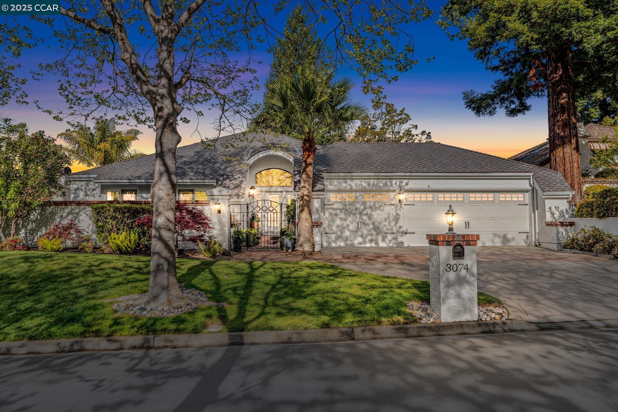 This beautifully remodeled property exudes perfection with the finest materials and craftsmanship throughout. The expansive chef’s kitchen is a true showstopper, featuring a large center island, high-end appliances, and elegant porcelain tile floors. Floor-to-ceiling windows flood the space with natural light, offering breathtaking views of the sparkling pool and the lush golf course beyond. The open layout seamlessly flows into the inviting family room, perfect for entertaining and everyday living. The entryway has been thoughtfully reimagined—no longer featuring a wet bar, it now leads to the luxurious primary bathroom. Here, you’ll find spacious his-and-her closets, including a walk-in with custom features designed to maximize storage and style. The primary bathroom is a true retreat with a large soaking tub, a separate glass-enclosed shower, and a custom vanity that epitomizes modern luxury. The guest bathroom has also been fully renovated with exquisite finishes, ensuring comfort for visitors. The primary bedroom has been updated with brand-new carpet, adding to the sense of warmth and coziness. The interior was freshly painted less than a month ago, offering a pristine, move-in-ready feel. Additionally, this home boasts a new roof for added peace of mind. A MUST SEE HOME!