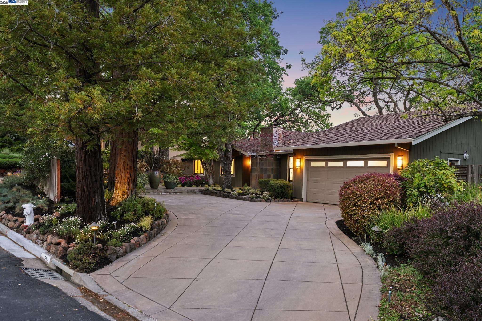 Stunning remodeled property with breathtaking views of Mount Diablo and rolling hills, designed to live like a single-story home. Relax with a glass of wine or morning coffee on the spacious deck, soaking in the peaceful and serene vistas. The living room boasts vaulted ceilings and a beautifully remodeled fireplace, creating a warm, open atmosphere. The functional kitchen opens to a cozy sitting area with sliding doors to a private upper deck—perfect for casual lounging. Entertain with ease in the expansive dining room featuring volume ceilings and floor-to-ceiling windows that frame the spectacular scenery. The luxurious main-level primary suite includes a spa-inspired bath with a large walk-in shower with bench, freestanding tub, dual vanities, and more stunning views. Two secondary bedrooms are also on the main level, with two additional bedrooms downstairs and access to a lower deck. New carpet, paint, recessed lighting, and light fixtures throughout. Light and bright throughout. Close to top-rated Walnut Creek schools, hiking/biking trails, and commute routes—this home blends luxury, comfort, and convenience.