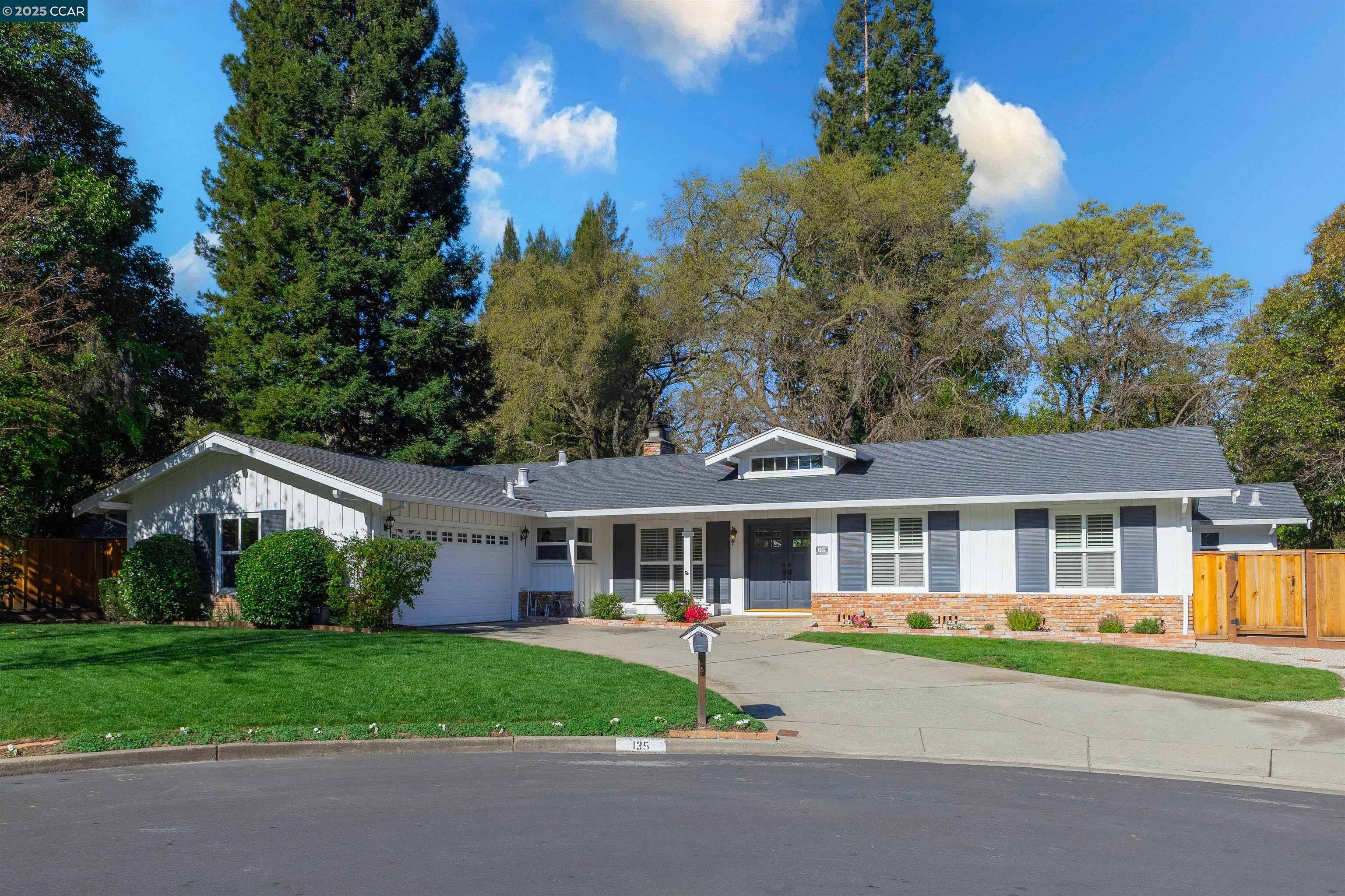 Nestled in a highly sought-after Westside Danville neighborhood, minutes to downtown, this thoughtfully updated single-story ranch-style home offers 3,137 sf of living space on a flat 0.36 acre lot. The property boasts charming style and curb appeal! Step into the lovely, private backyard complete with a swimming pool, expansive lawn/play area, and spacious patio equipped with a gas firepit and brick seating wall. Designed for modern living, the open-concept floor plan includes 5 bedrooms and 3.5 baths. The warm and inviting family room seamlessly connects to the updated kitchen, featuring a built-in banquette and a central island with bar seating--ideal for both everyday living and entertaining. The family room opens directly to the backyard, enhancing the indoor-outdoor living experience. There is a guest suite/full bath with separate entrance. The primary/powder/guest baths are updated. Located at the end of a cul-de-sac, the home ensures privacy while providing convenient access to downtown Danville's many shops, restaurants and amenities. Outdoor enthusiasts will appreciate the proximity to the Iron Horse Trail and the Las Trampas Foothills. Del Amigo Swim Club is just a short walk away. Close to top-rated SRV schools, and a great commute location to Highways 680/24.