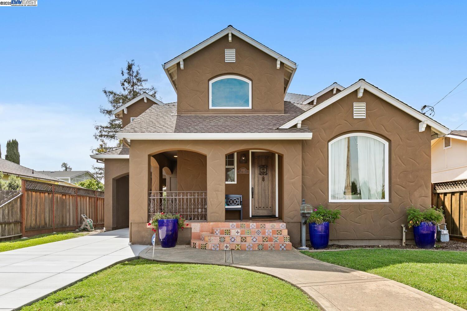 **Custom Downtown Livermore Beauty with Extra-Large Garage & Smart Comfort!** Rebuilt in 2008 from the ground up—preserving just a few original walls—this stunning home blends classic style with modern craftsmanship. It features high ceilings, abundant natural light, and a spacious open layout. Custom trim, oversized windows, and rich cabinetry add character throughout. The chef-inspired kitchen has a massive island, a commercial 6-burner gas range, and extensive storage—perfect for entertaining or everyday meals.  Enjoy year-round comfort with a dual-zone HVAC system and two Nest thermostats, which provide personalized climate control and energy efficiency. Bonus is extra-large 4-car detached garage** fully insulated with 10’ ceilings, 8’ doors, ideal for car collectors, a home gym, workshop, or ADU potential (buyer to verify). Located in a prime walkable neighborhood just blocks from downtown Livermore’s shopping, dining, and entertainment. So an unlimited potential—don't miss it! 3rd Bath added with permits.