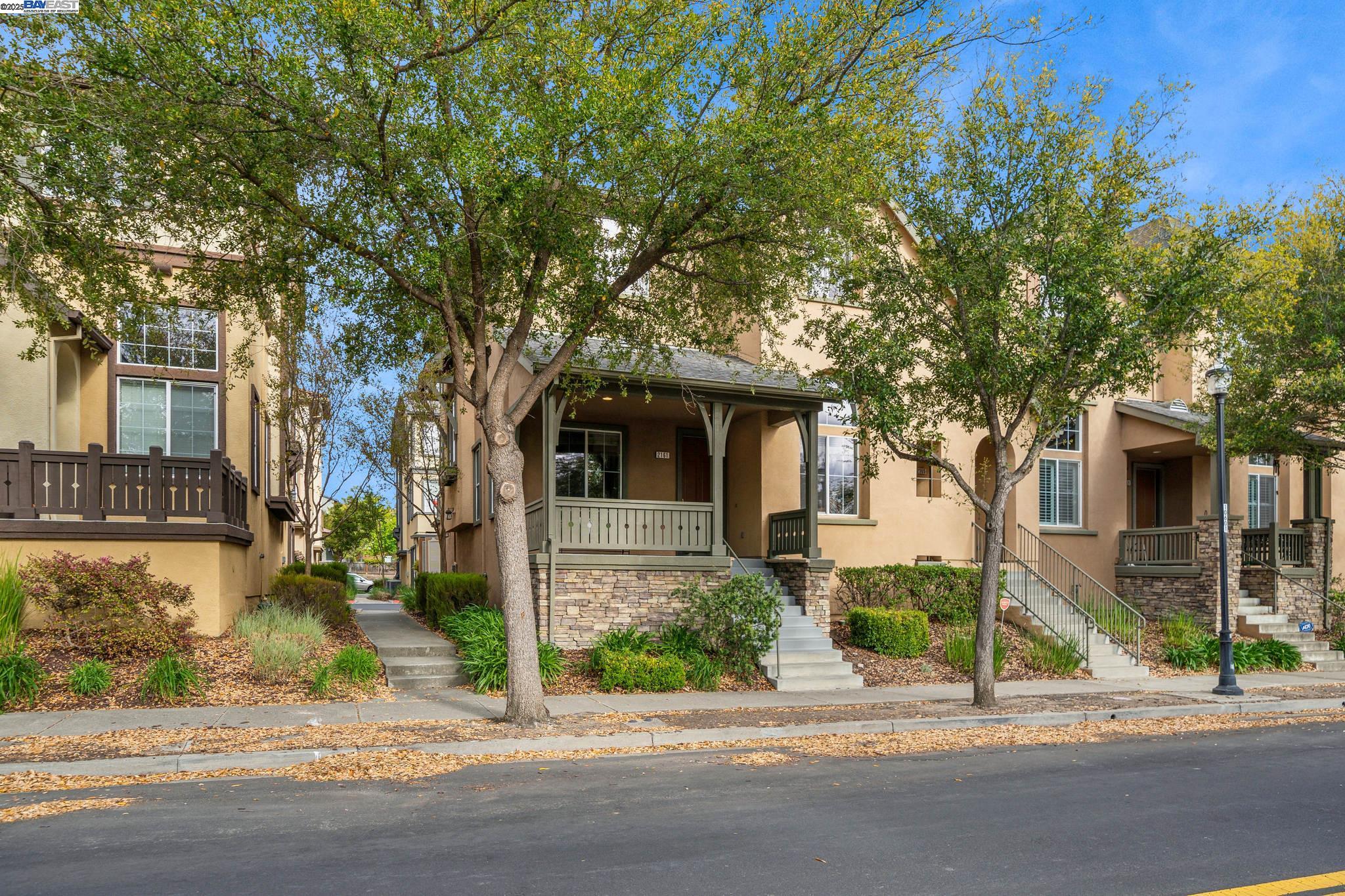 Beautifully Updated Windemere End-Unit Townhome Style Condo Facing Open Space & Minutes to the Community Pool, Souyen Park, Walking Trails & Tennis Courts. Close to Top-Rated San Ramon Schools, Shopping & Restaurants. Hardwood Flooring Throughout!  Multi-Generational Living Opportunity w/spacious downstairs bedroom & adjacent full bathroom with tiled shower. Formal Living Room w/Soaring Ceilings overlooks the covered front porch.  Off the living room is the 2 Car Garage w/ample storage & Laundry Room w/abundant cabinets. Entertain your guests in the formal dining room w/an elegant light fixture. Open Concept Kitchen & Family Room has access to the East Facing private balcony. Gourmet Kitchen has a large center island w/Breakfast Bar, granite countertops, tiled backsplash, built in oven, microwave & gas range/cooktop, stainless steel refrigerator, pantry cabinets & desk. Family Room has a gas fireplace w/custom mantle & built-in media niche. Spacious versatile loft upstairs is ideal for watching tv, playing games or a home office. The secondary bedroom has a walk-in closet & hall bath that has a shower/tub combo. Luxurious Primary Suite boasts boasts of a spa-inspired bathroom w/dual sinks, soaking tub, large shower, & walk-in closet w/custom organizer.