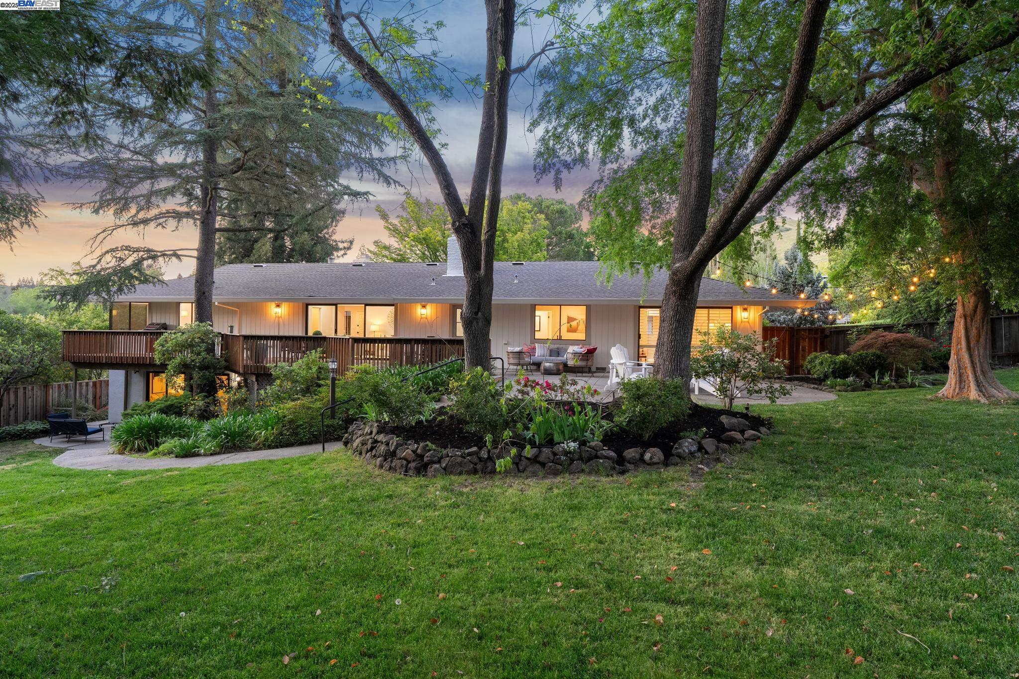 Nestled in the prestigious Roundhill Country Club, this completely remodeled home offers the perfect blend of functionality and comfort. With 4 spacious bedrooms plus a bonus room, 2.5 bathrooms, & nearly 3,000 sq ft of beautifully updated living space, it sits on a private & sprawling 0.51-acre lot. Relish in the serene remodeled primary bedroom suite w/beautiful views of the backyard & a luxurious bathroom w/large walk-in shower & dual vanities. Spacious living room w/newly designed fireplace - perfect for cozying up with family & friends. Step onto the deck to savor your morning coffee or unwind at golden hour with a glass of wine. The home features new hardwood flooring, recessed lighting, modern light fixtures, a newer HVAC system, enhanced drainage, new water heater, upgraded electrical panel, Tesla charger, updated landscaping, & new appliances—every detail thoughtfully upgraded. The inviting family room with a cozy fireplace opens to an expansive backyard with lush lawn, patio, & deck—perfect for entertaining, al fresco dining, or even adding a pool. Located minutes from scenic trails, award-winning schools, & Roundhill’s golf, tennis, pickleball, & social amenities, this is refined living in one of the East Bay’s most sought-after communities.