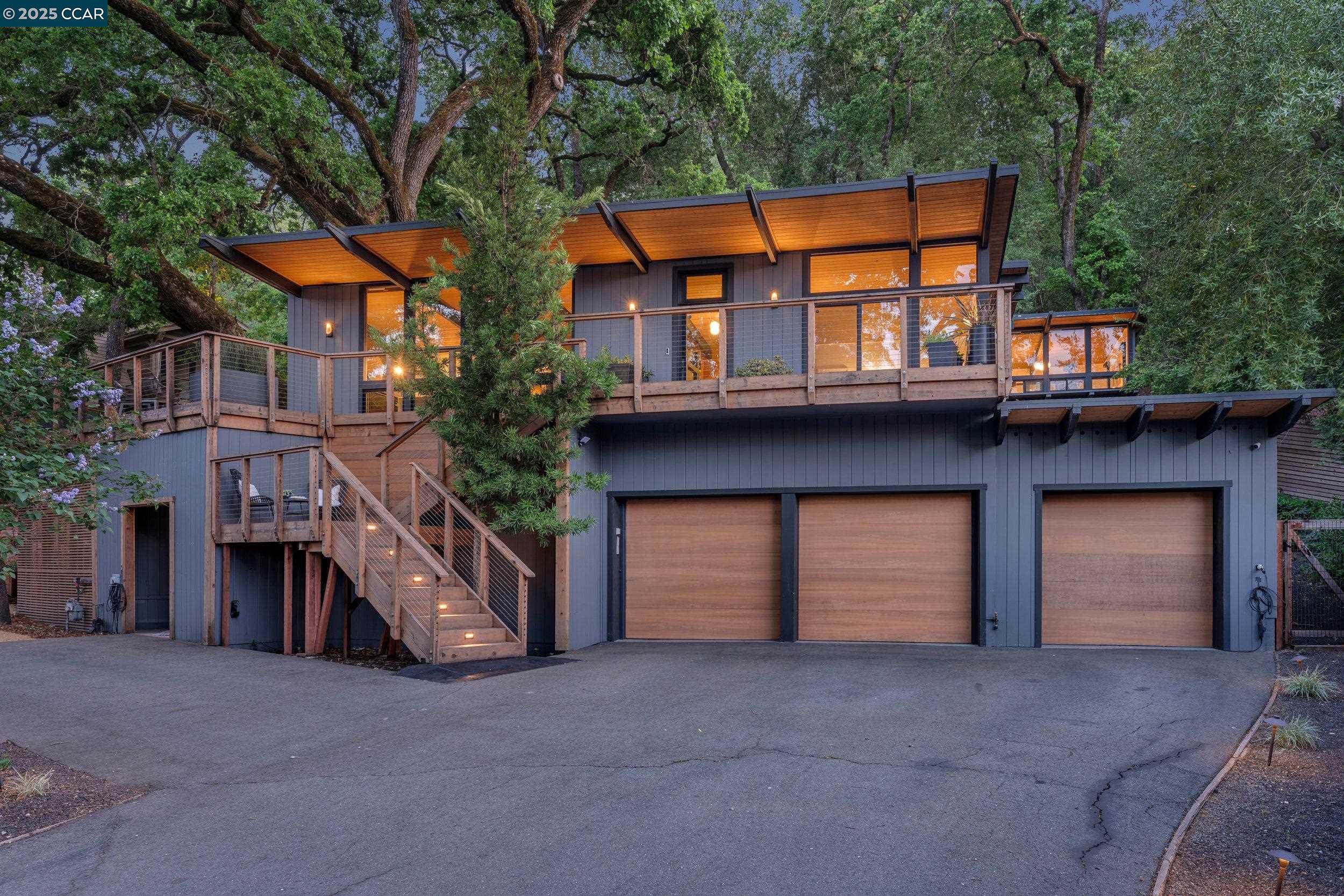 A rare architectural jewel on Danville’s coveted Westside, this iconic mid-century modern was originally designed by renowned architect Wayne Littlejohn and artfully reimagined by See Architecture in 2018. Crisp lines, soaring ceilings, and walls of glass blur the line between indoors and nature, while preserving the essence of mid-century design. Open, airy living spaces flow seamlessly to outdoor decks, patios, and curated gardens, ideal for entertaining or tranquil retreats. Designer kitchen features sleek cabinetry, high-end appliances, and a stunning quartz island. The primary suite is a private sanctuary with spa-inspired bath and expansive views. Flexible layout includes a bonus room downstairs. Steps from the Iron Horse Trail, top-rated schools, and downtown Danville’s restaurants, shops, and farmers market. For the discerning buyer seeking architectural pedigree, modern comfort, and a connection to nature—this is a rare opportunity to own a true Westside masterpiece.