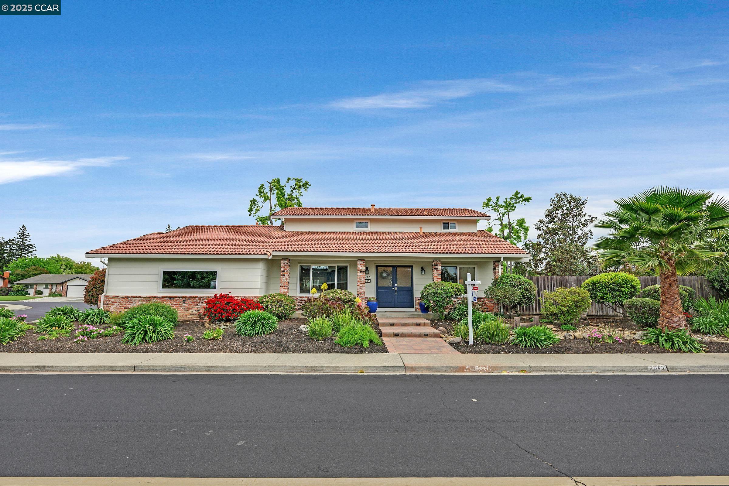 Fabulously upgraded home in desirable neighborhood of Walnut Creek! Nestled on a corner lot in the sought-after Carriage Square development. 4 beds, 3 baths, 2,265 square feet of living space, approx 10,000 sq ft flat lot. Open floor plan with formal living and dining rooms, separate family room open to updated kitchen and backyard. Ground floor primary suite plus another room that could serve as an extra bedroom or home office. Three additional upstairs bedrooms, including a full bathroom with dual sinks. The kitchen is a culinary haven that showcases beautiful quartz countertops complemented by updated stainless steel appliances and slow-closing drawers and cabinets. Kitchen is open to family room with a cozy fireplace that adds warmth and charm to the family room. Step outside through the sliding doors to discover a spacious backyard oasis, complete with a sparkling pool, lush landscaping, and ample garden space, perfect for outdoor relaxation and entertaining. Recent upgrades include new interior and exterior paint, new baths, wood floors, some new landscaping/hardscaping and more! Close access to freeways, BART, Shopping, Walnut Creek schools, private schools De La Salle and Carondelet and scenic hiking trails, fabulous restaurants and WC downtown. Don't miss this Jewel!