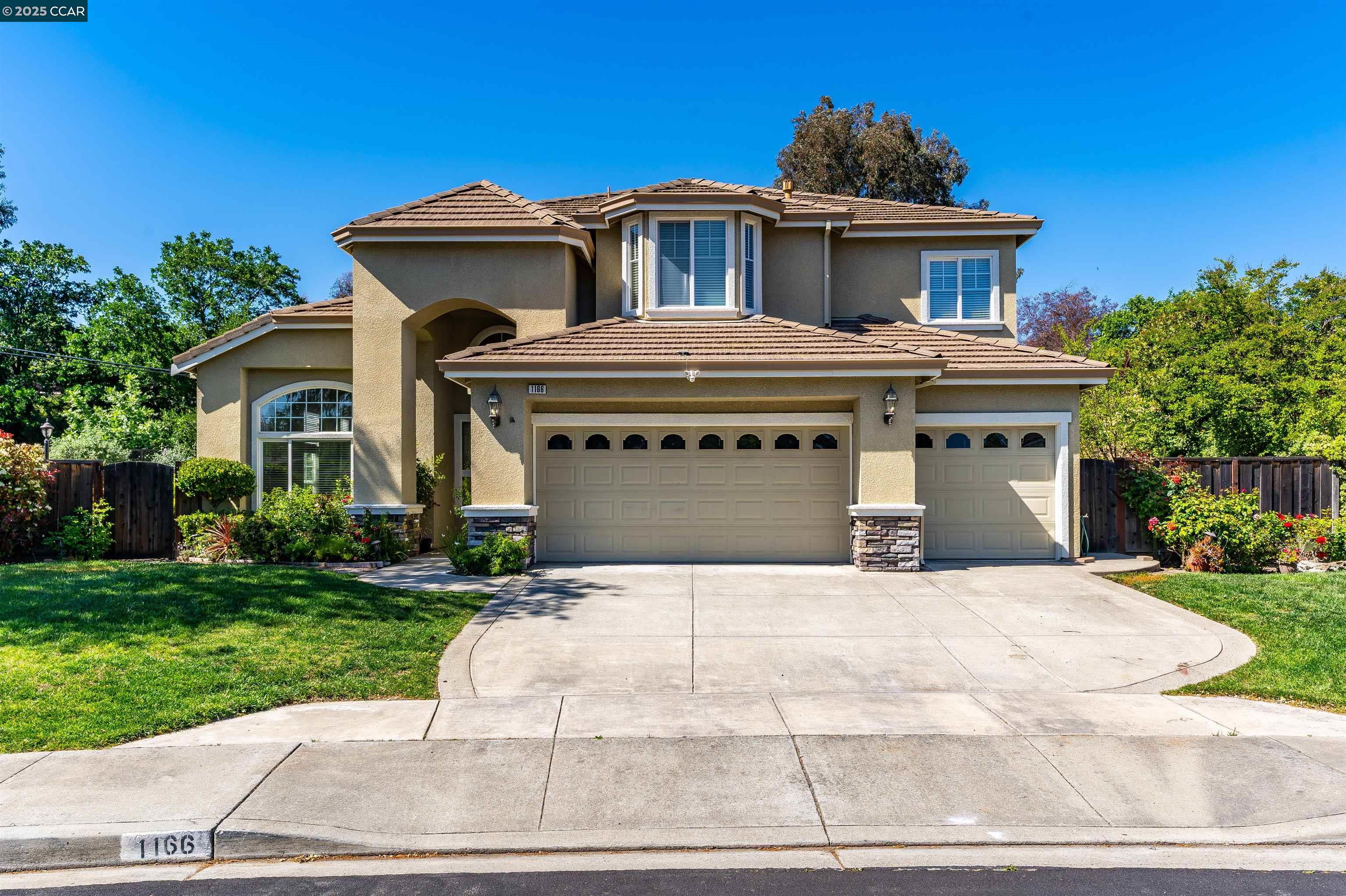Tucked away on a secluded court, this 5-bedroom, 3 full bathroom home offers the ideal blend of comfort, convenience, and fun. The flat lot is perfect for entertaining, featuring a heated pool and spa where you can relax or host unforgettable gatherings throughout the year. The spacious yard is adorned with fruit trees, roses, fresh new grass, and wood chips throughout, adding charm, color, and easy maintenance to the outdoor space.  Inside, you will love the soaring high ceilings leading into the updated kitchen with quartz countertops and a thoughtful layout. The master bathroom has also been beautifully updated, and there is partial carpet replacement throughout the home for a fresh and inviting feel. A rare first-floor bedroom and full bathroom offer flexibility and are perfect for guests or multi-generational living. The three-car garage provides plenty of space for vehicles, storage, or hobbies.  Commuters will appreciate the unbeatable location, just a short walk to the BART station for easy access to the Bay Area. Students can attend top-rated schools including Indian Valley Elementary, Walnut Creek Intermediate, and Las Lomas High School (see disclosures). This beautiful home is located in a quiet neighborhood court near shopping, dining, and freeway access.