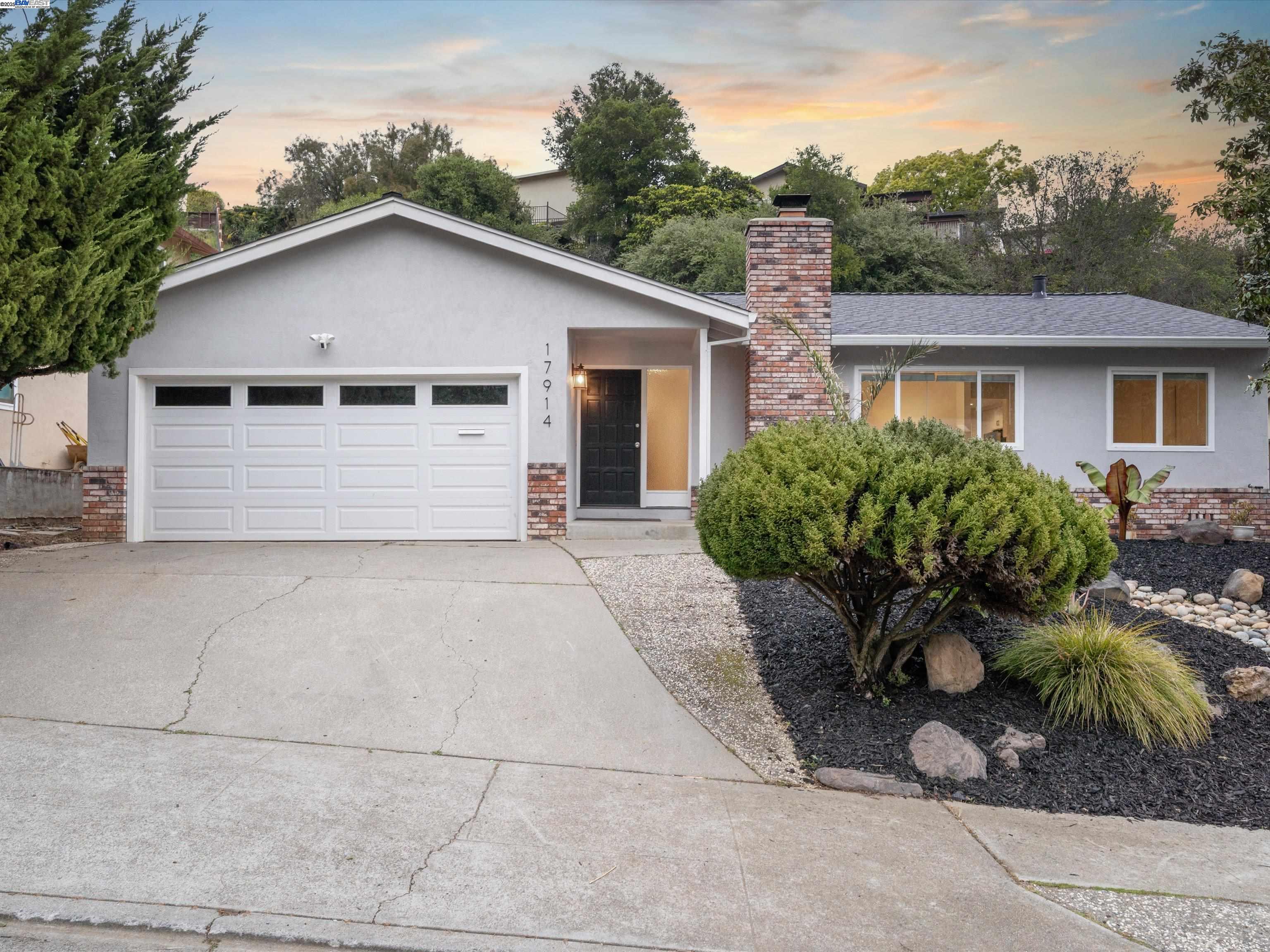 Nestled at the end of picturesque Joseph Drive in a private, court-like setting, this highly sought-after single-level home is located in the desirable Proctor area of Castro Valley. This charming 3-bedroom, 2-bathroom residence offers 1,436 square feet of artfully designed space.  Extensive updates in 2022 introduced luxury vinyl plank flooring, new baseboards, dual pane windows, new exterior paint, and a modern kitchen with quartz countertops and stainless steel appliances. Recent enhancements include new interior paint, a new furnace and ducts, attic insulation, and additional recessed lighting. The front landscaping has been updated, and the backyard now features a new second retaining wall, hardscape, and French drain, perfect for outdoor enjoyment.  The welcoming living room, featuring a cozy fireplace and picture windows, flows seamlessly into the dining area—perfect for entertaining, while the primary bedroom boasts an ensuite bath with quartz finishes. Located in a community known for top-rated schools and a vibrant downtown, you’ll have access to trails at Lake Chabot, Chabot Golf Course, and convenient commuting via BART and the 580 freeway. This home perfectly blends modern comfort and convenience. Don’t miss your chance to make it yours!