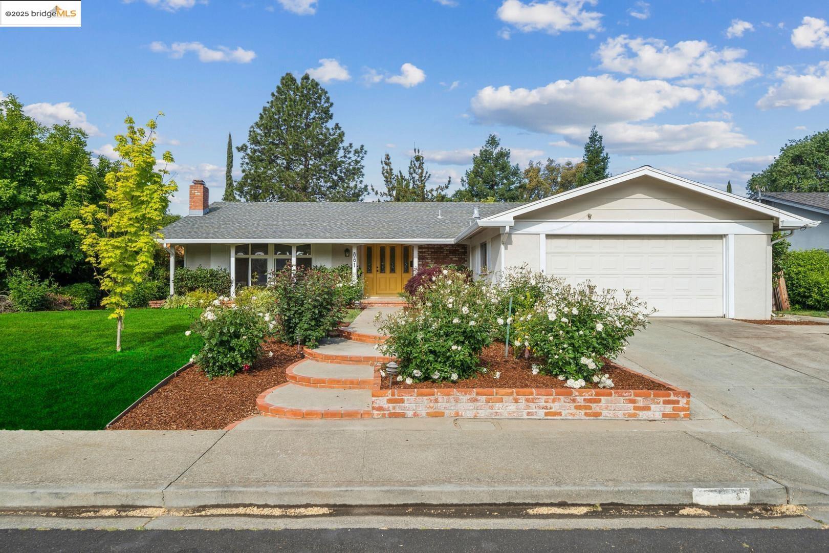 Classic Ranch Living in Northgate Nestled in a quiet, low-traffic circle in Walnut Creek's sought after NORTHGATE neighborhood, known for its welcoming community and neighborly atmosphere. This thoughtfully updated 3-bedroom, 2-bath home blends classic California ranch charm with a clean, intuitive layout for modern living. A bright formal entry welcomes you, flowing to spacious living areas anchored by a striking midcentury slate fireplace, then onward to a large kitchen & dining area. Natural light highlights beautiful oak hardwood floors and an updated kitchen featuring quartz countertops, custom cabinetry, new appliances, and premium finishes. Step outside to a large patio, shaded pergola, and expansive backyard with young fruit trees and ample space for gardens or play. Enjoy proximity to top-rated Northgate schools, local parks, swim clubs, and nearby trails, with downtown Walnut Creek and major commuter routes just minutes away.