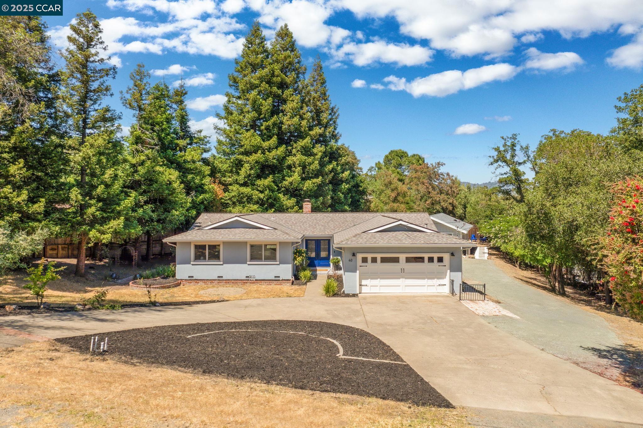 Rare opportunity in Walnut Creek: 1,642 sq ft 3BD/2BA main home plus 800 sq ft 2BD/1BA ADU on a flat .48-acre lot, featuring a circular driveway with RV parking & additional side parking. Renovated main residence offers seamless open-concept living anchored by an inviting living room, sleek linear fireplace & MSI LVT flooring throughout. At its center is a show-stopping kitchen featuring dramatic quartz countertops, elegant soft-gray cabinetry, brushed gold hardware & designer lighting. Large center island provides breakfast bar seating & generous prep space, while built-in wine & beverage fridges add convenience & flair. The space is completed by professional 8-burner gas range with double ovens, pot filler & statement hood. The private primary suite opens directly to the backyard & offers a serene retreat, while the guest bedrooms & updated bathrooms reflect the home's refined aesthetic. The ADU includes a private entrance, updated kitchen with new appliances, in-unit laundry hook-ups &  modern bath—ideal for guests or rental income. Expansive backyard surrounded by mature trees with multiple zones for relaxing, entertaining, or play. All just minutes from the Linda Vista community pool, downtown Walnut Creek’s vibrant shops, restaurants, top-rated schools, hiking trails & BART